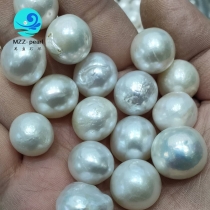 13mm round nucleated pearls