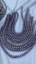 purple round freshwater pearls