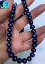 black natural pearls strand